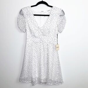 SUPER down white polkadot mini dress